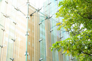 Sky and clouds reflected in a modern building glass facade